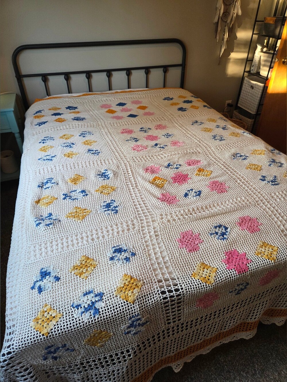 Handmade White Crochet Bedspread with Pink, Blue, and Yellow Floral Motifs